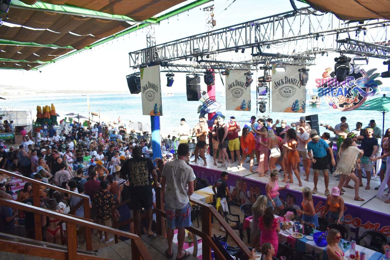 Beach party crowd at Mango Deck on Medano Beach